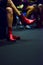 Close view of a woman wearing a red boots at Momad 2023 Madrid Spain