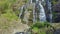 Close wide aerial view powerful waterfall in highlands