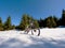 Close wide view to bike stays in snow. Winter snowy mountains