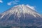 Close zoom detail of top covered with snow of Fuji mountain in Japan.