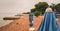 Closed beach parasol at empty seaside coast in Crikvenica, Croatia