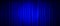 Closed blue theater stage curtain with spotlight.