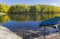 Closed boat station on the pond in the fall