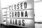 Closed businesses for CoronaVirus pandemic outbreak, closure sign on retail store window banner background. Government shutdown of