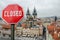 Closed, close stop sign with view of Prague, Czech republic