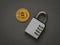 A closed combination lock and a large digital coin on a dark gray background. Flat lay