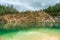 Closed down limestone quarry now serves as a bathing place with