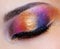 Closed eye with multicoloured eyeshadow