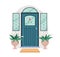 Closed front door of house outside. Home entrance exterior with stained glass, windows, potted plants flowers. Doorway