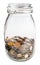 Closed glass jar with saved coins isolated