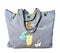 closed handmade gray canvas tote bag with applique