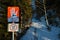 Closed hiking trail warning sign to STOP because of avalanches