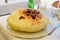 Closed Italian Calzone Pie on a white ceramic plate