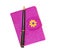 Closed notebook in a purple cover with a black ballpoint pen on