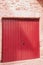 Closed, pair of, colorful, red, wood, door, shutters, reidence in Sablet, France