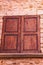 Closed, pair of, weathered, brown, wood, window shutters