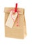 Closed paper bag with tag