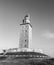 closed plan of tower of hercules in galicia with bank and black filter