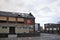 A closed public house stands derelict and boarded on a housing estate in hunslet leeds after being attacked by vandals.