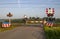 Closed railroad crossing with red lights at the Tweede Tochtweg in Nieuwerkerk aan den IJssel