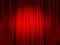 Closed red curtain. Spotlight round spot on red velvet veil background, drama theater, velours textile drape stage decor