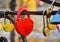 Closed red padlock. Red padlock in the form of heart.
