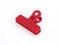 Closed red plastic medium size clothespin for plastic bags isolated on a white background