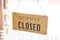 Closed shop sign - Sorry we`re closed sign hanging on cafe glass door