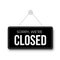 Closed signboard hanged on wall. Black rectangular shape clipboard for retail, shop, store, cafe, bar, restaurant