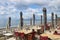 Closed sunshades on  the beach of Kalamata, in spring. Peloponnese, Greece.