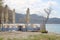 Closed sunshades and open-air restaurant on the beach of Kalamata. Peloponnese, Greece.