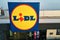 Closed supermarket with Lidl logo, aerial view