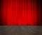Closed theater red curtain and wood stage or scene