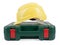 Closed tool box with construction yellow helmet