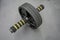 Closed up abdominal roller wheel with foam handle. Rolling push