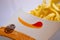 Closed up of Burger King\'s french fries on white background. Focus on Burger King\'s logo