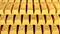 Closed up of shiny gold bars arrange and stack up in the perfect position row. Reflection of light on the gold bar.
