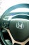 Closed up shot of Honda Logo at steering wheel