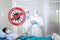 Closed up Stop Coronavirus sign stuck in front of the emergency room of a patient infected with Covid 19 virus and Medical team in