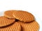 Closed up Stroopwafel Cookies, Tasty Dutch Traditional Sweets Served on White Plate Isolated on White Background