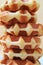 Closed up Texture of Fresh Baked Belgian Waffle Stack, Vertical Photo