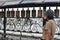 closed up woman spins the prayer wheel at temple in Kathmandu, Nepal