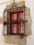 Closed window with iron grills and horseshoes. Basque Country.