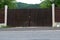 Closed wood gates that protects property in the mountains