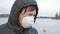 A closer look of the lady wearing a mask in Lake Bodom