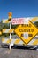 A closer look at road barrier and warning signs at entrance to an Illinois state campground during the COVID-19 pandemic