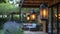 A closer look at a rustic lanternstyle light hanging above a wooden patio creating a rustic yet elegant ambiance