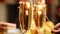 Closeup 4k footage of romantic couple holding sparkler next to glasses of fizzy champagne. Family celebrating Christmas