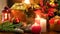 Closeup 4k video of burning candles against colorful baubles, boxes with gifts and presents from Santa and Cristmas