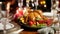 Closeup 4k video of tasty baked chicken lying on dish on festive table. Christmas dinner